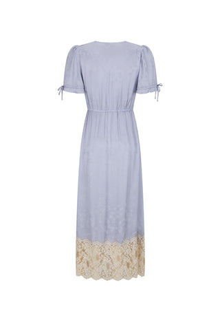 a-light-blue-midi-dress-with-short-puff-sleeves-tie-details-at-the-cuffs-a-gathered-waist-and-a-beige-lace-hem-shown-against-a-plain-white-background
